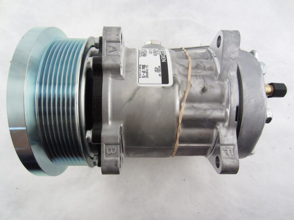 COMPRESOR CATERPILLAR OREJA 8PK 12V SD7H15 8GRV 119MM 12V ORIGINAL SANDEN